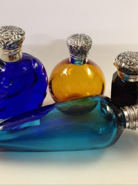 mixed silver perfume bottles with cut glass bottles